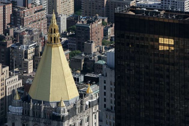 Das Empire State Building - über den Dächern von Midtown Manhattan, New York City Das Empire State Building - über den Dächern von Midtown Manhattan, New York City