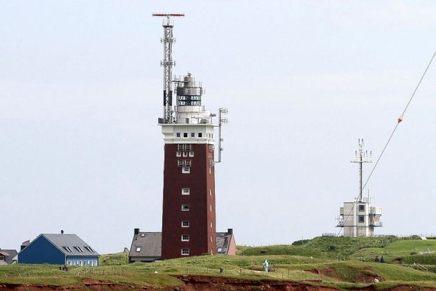 Leuchtfeuer Helgoland - das Seefeuer auf dem Oberland, 1942 aus rotbraunen Mauerziegeln erbaut, Höhe 35 Meter Leuchtfeuer Helgoland - das Seefeuer auf dem Oberland, 1942 aus rotbraunen Mauerziegeln erbaut, Höhe 35 Meter