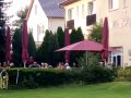 Schlossinsel Mirow - Gartenterrasse des Restaurants und Hotels Alte Schlossbrauerei am Mirower See