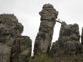 Der Blick auf den Treppenfelsen und den Turmfels der Externsteine im Teutoburger Wald von S&uuml;dwesten