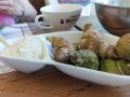 Erquy - Wellhornschnecken, Meeresfr&uuml;chte im Fischrestaurant 'Le table de Jeanne' am Bootshafen