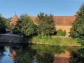 Lübben im Spreewald - der Hexenturm mit Feuerwehrmuseum und Stadtmauer an der Hauptspree